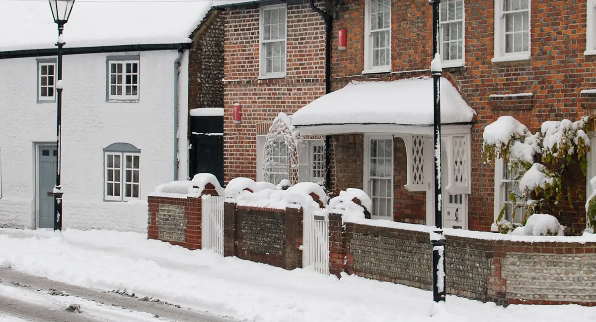 Houses covered in snow