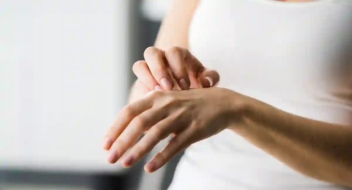 Woman scratching