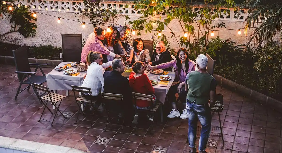 family sitting in the backyard